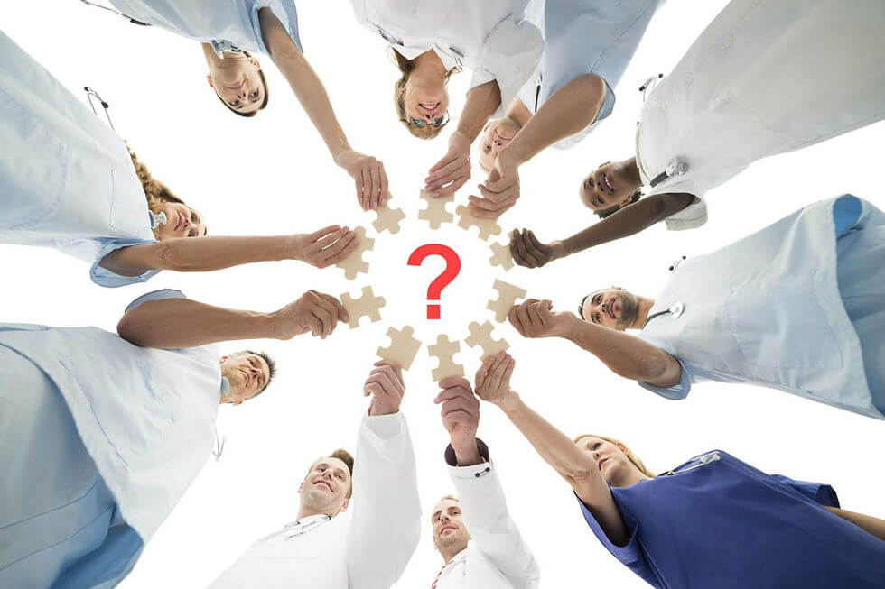 Reducing patient uncertainty: Healthcare providers connect puzzle pieces.